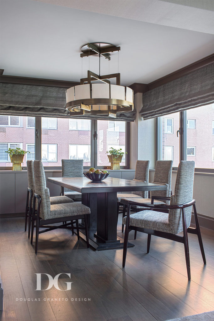 Contemporary dining area home design featuring a Dennis Miller Associates chandelier