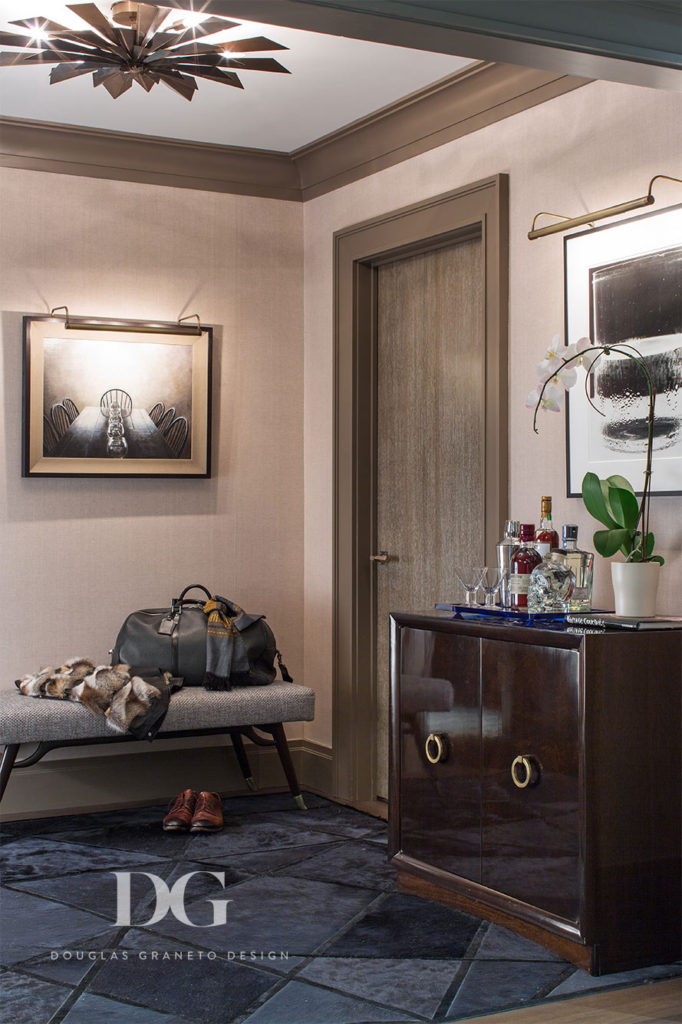 Stylish sitting area home renovation with Holly Hunt rug, Remains lighting, and mid-century antiques