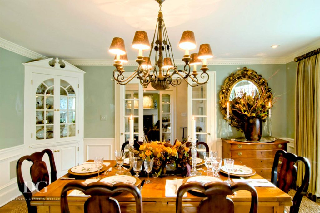 Updated Dining Room Featuring Stylish Chandelier