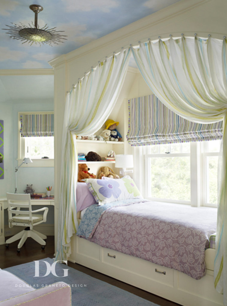 Playful girls bedroom featuring a canopy bed and furniture from Cowtan & Tout and Pierre Frey.