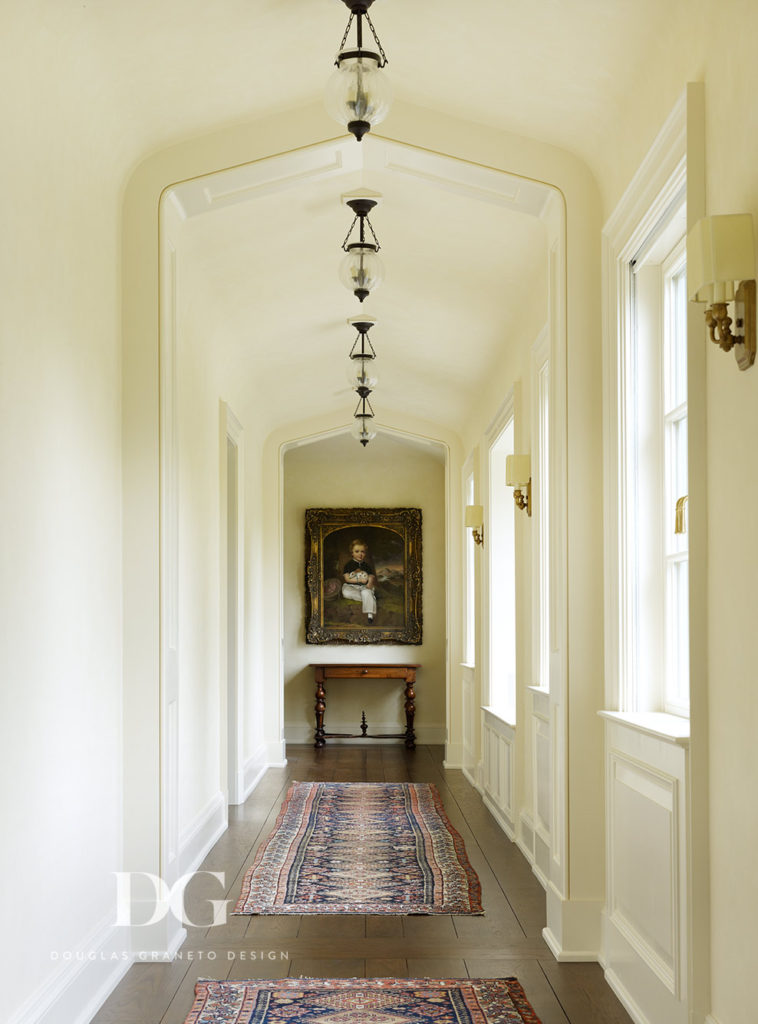 Hallway Featuring Fine Art and Dynamic Area Rugs