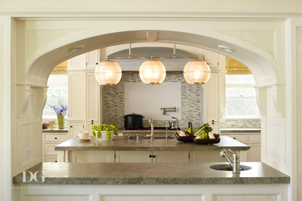 Stylish Southampton kitchen featuring Ann Morris Antiques and Ann Sacks tile.