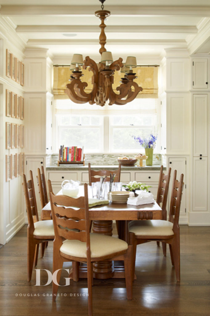 Dining area with kitchen table & rustic chandelier from Guillerme et Chambron and Charles Dudouyt Furniture.