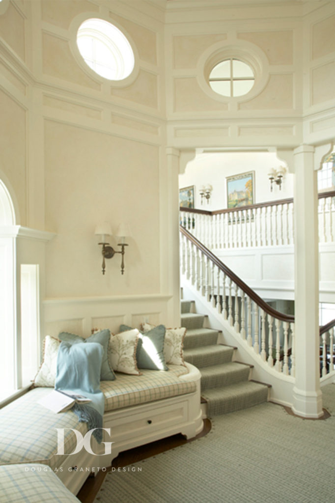 Landing area featuring comfortable custom seating and Elizabeth Eakins carpet.