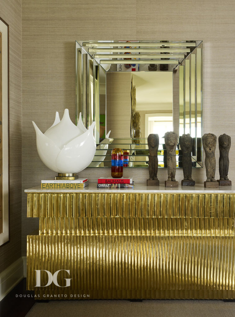 Gold table with gold accent mirror