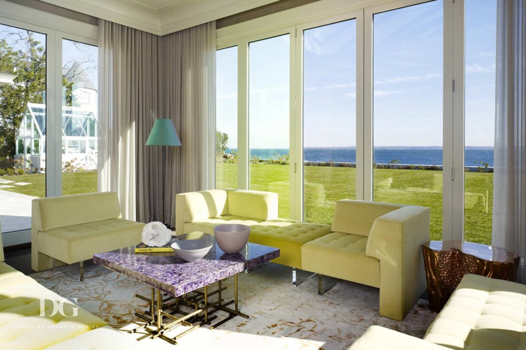 floor to ceiling glass doors and windows in renovated sunroom