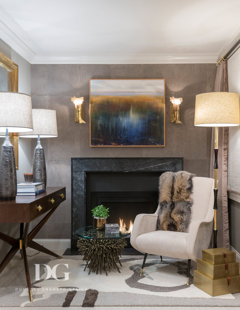 Stylish Sitting Area Featuring Modern Art and Fireplace