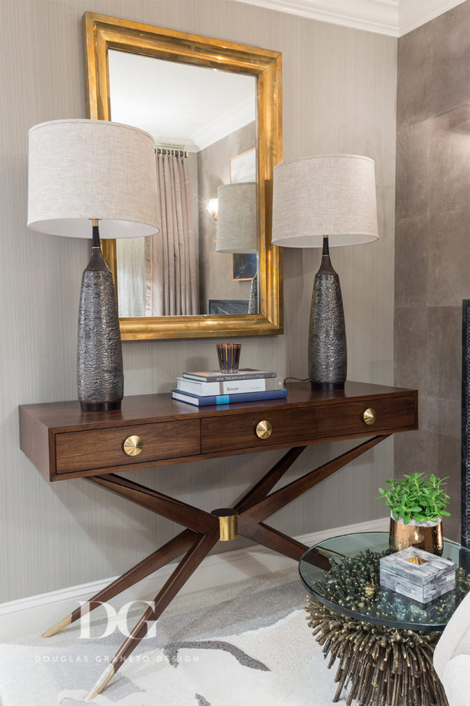 Contemporary Table, Gold Mirror, and Stylish Lamps