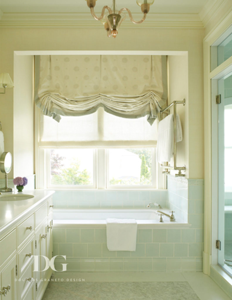Stylish Southampton master bath featuring tiled tub and Chelsea Editions.