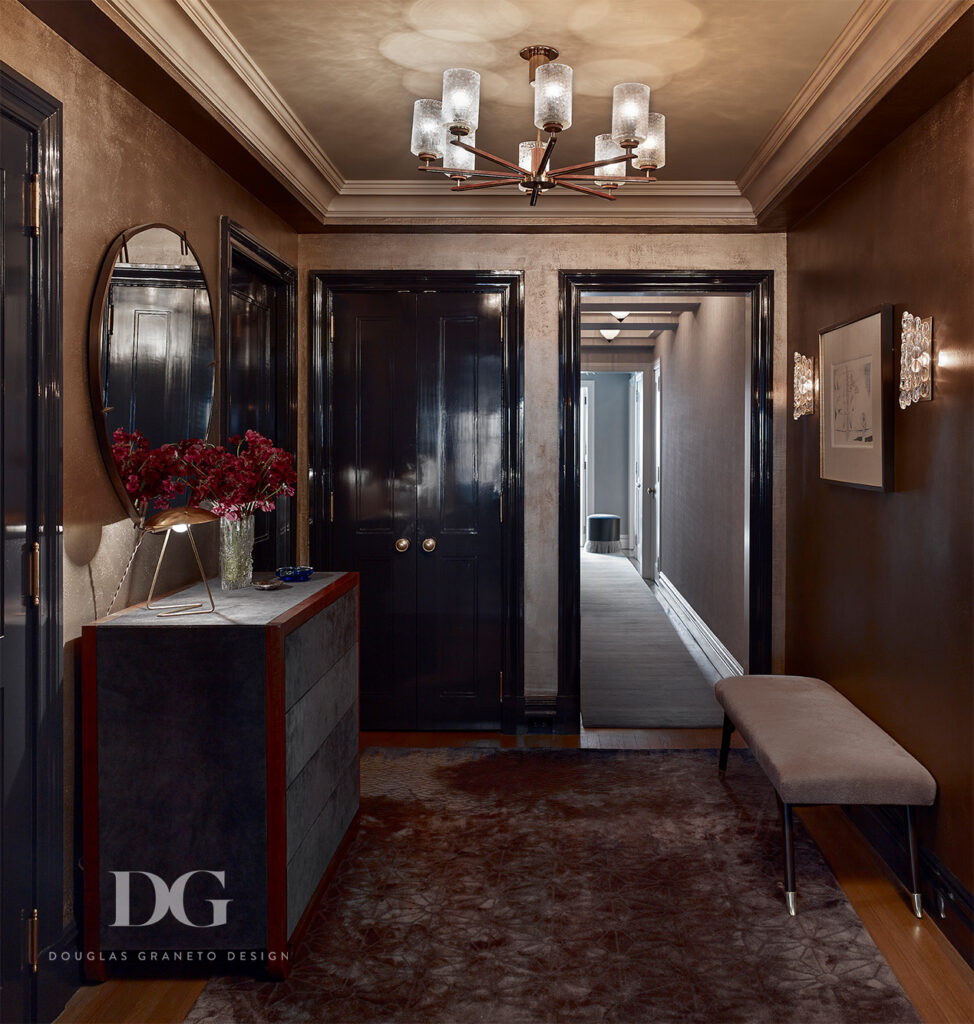 Entryway with high gloss trim, Edward Fields rug and vintage sconces