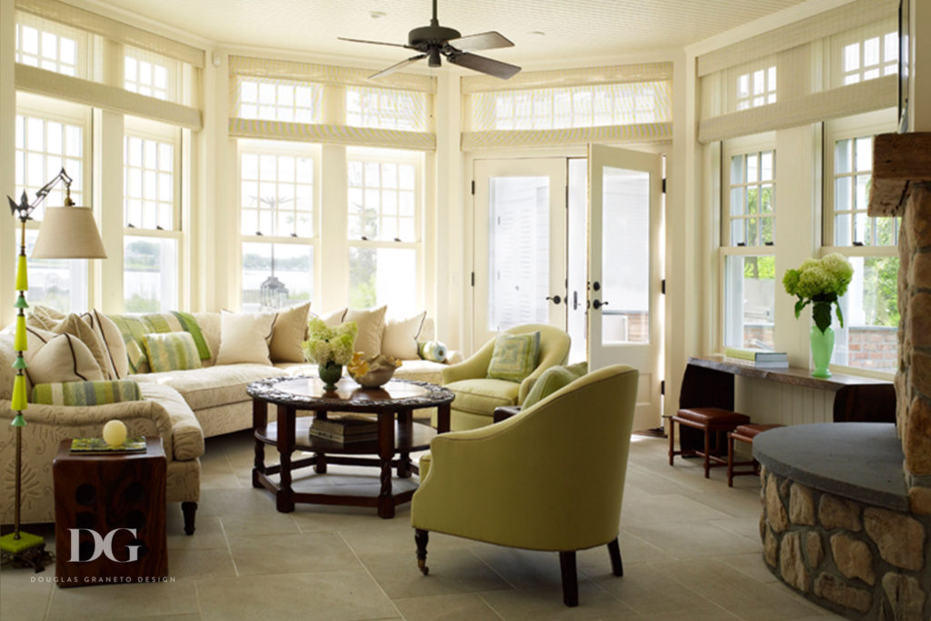 Welcoming Southampton sun room featuring a custom sofa.