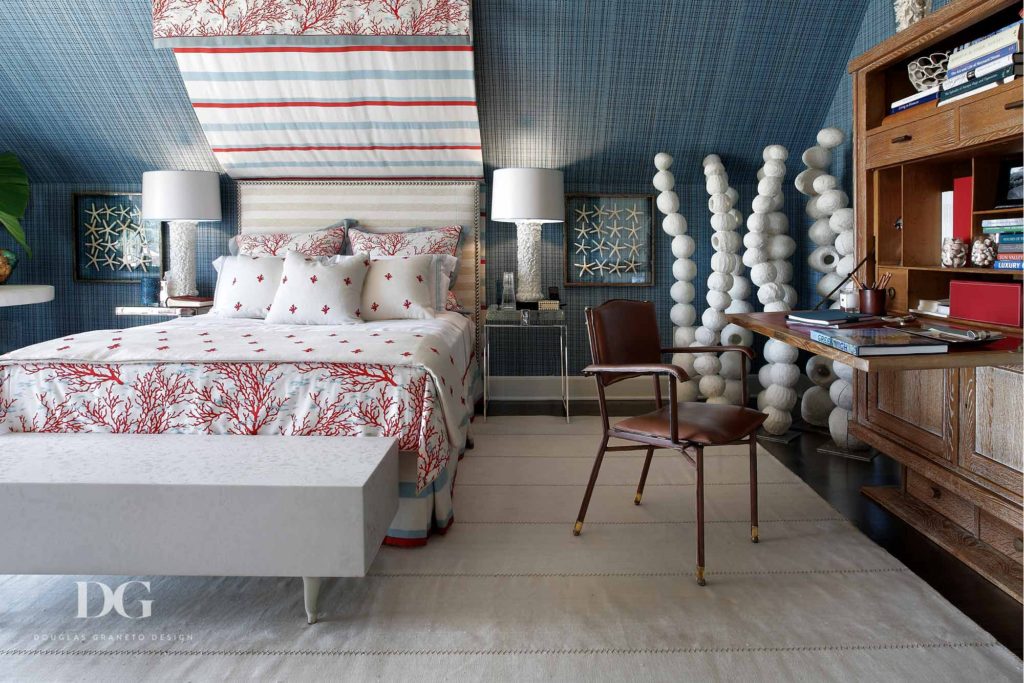 Southampton bedroom with a Tucker Robbins sculpture, a bench from Marcel Wanders, and a chair from Jacques Adnet.