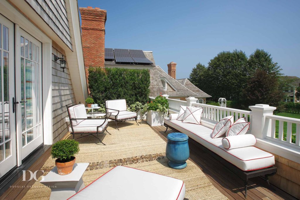 Renovated deck sitting area with Christopher Norman outdoor fabrics in Southampton, NY.